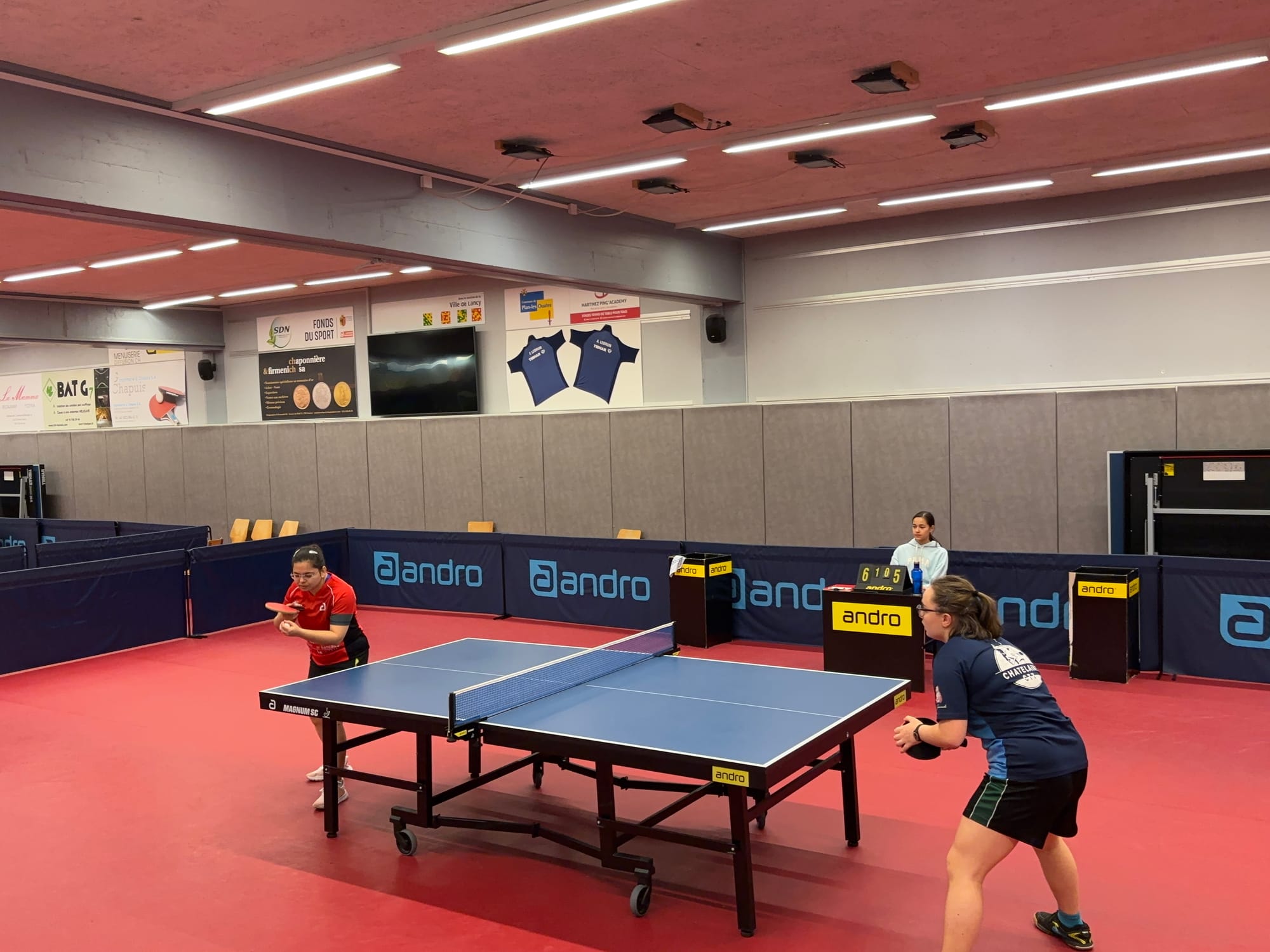 Two players playing Table Tennis