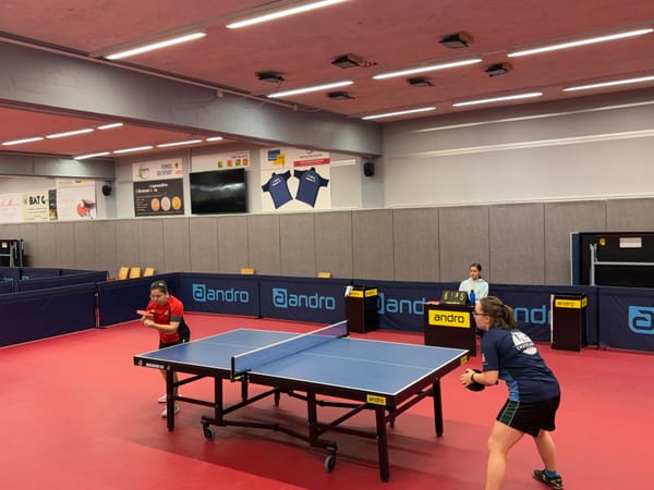Two players playing Table Tennis